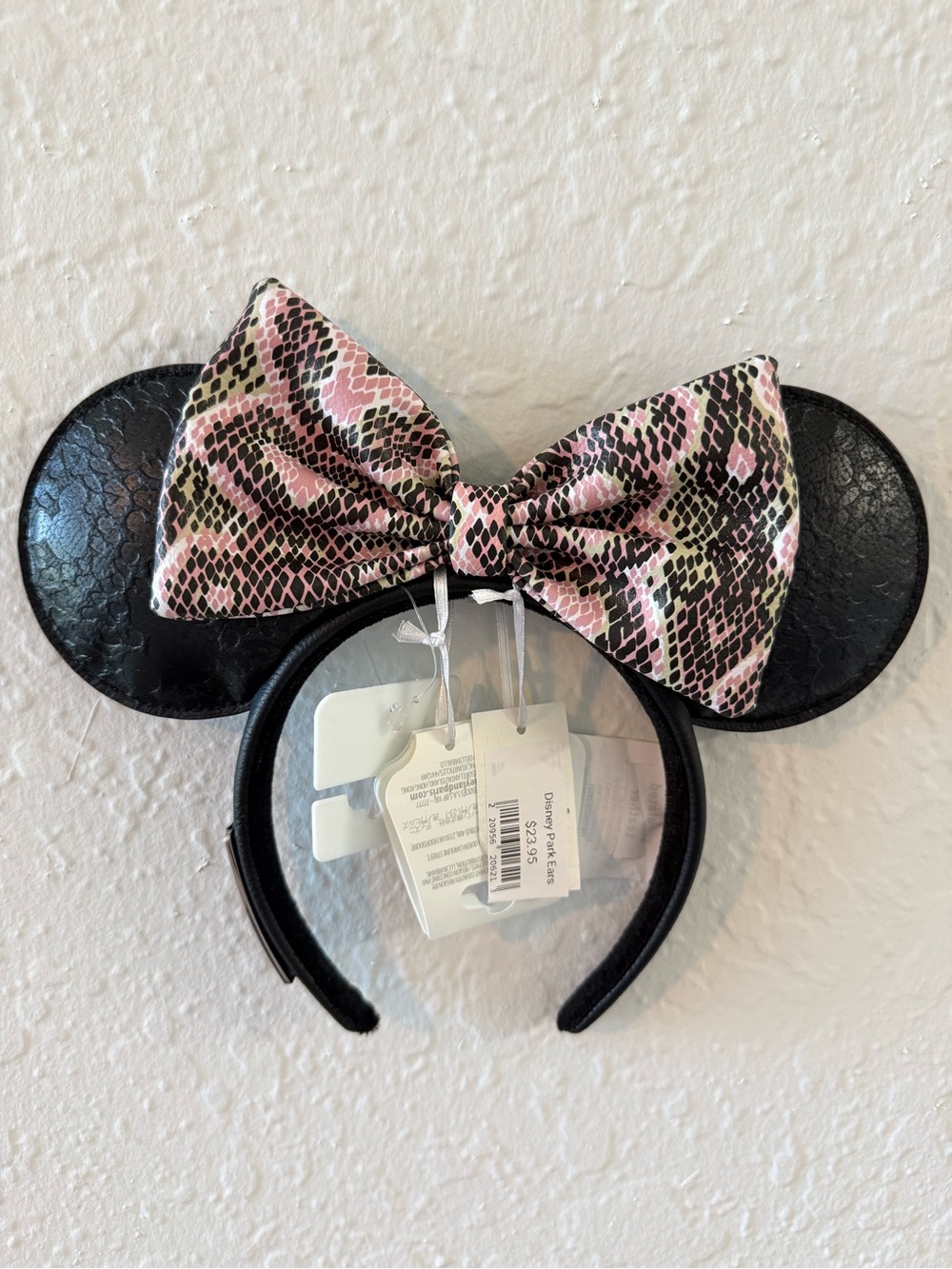 Disney Loungefly Black Ears Headband with Pink Snake-Print Bow